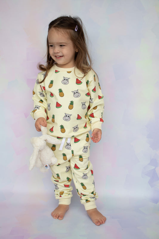 toddler girl wearing pineapple and watermelon print hungry hippo lounge set