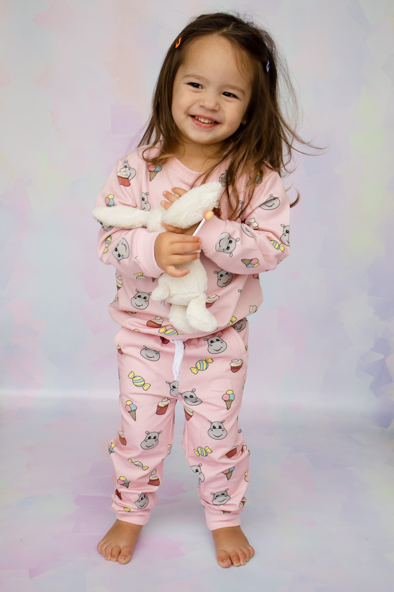 happy girl wearing our hungry hippo candy print lounge set