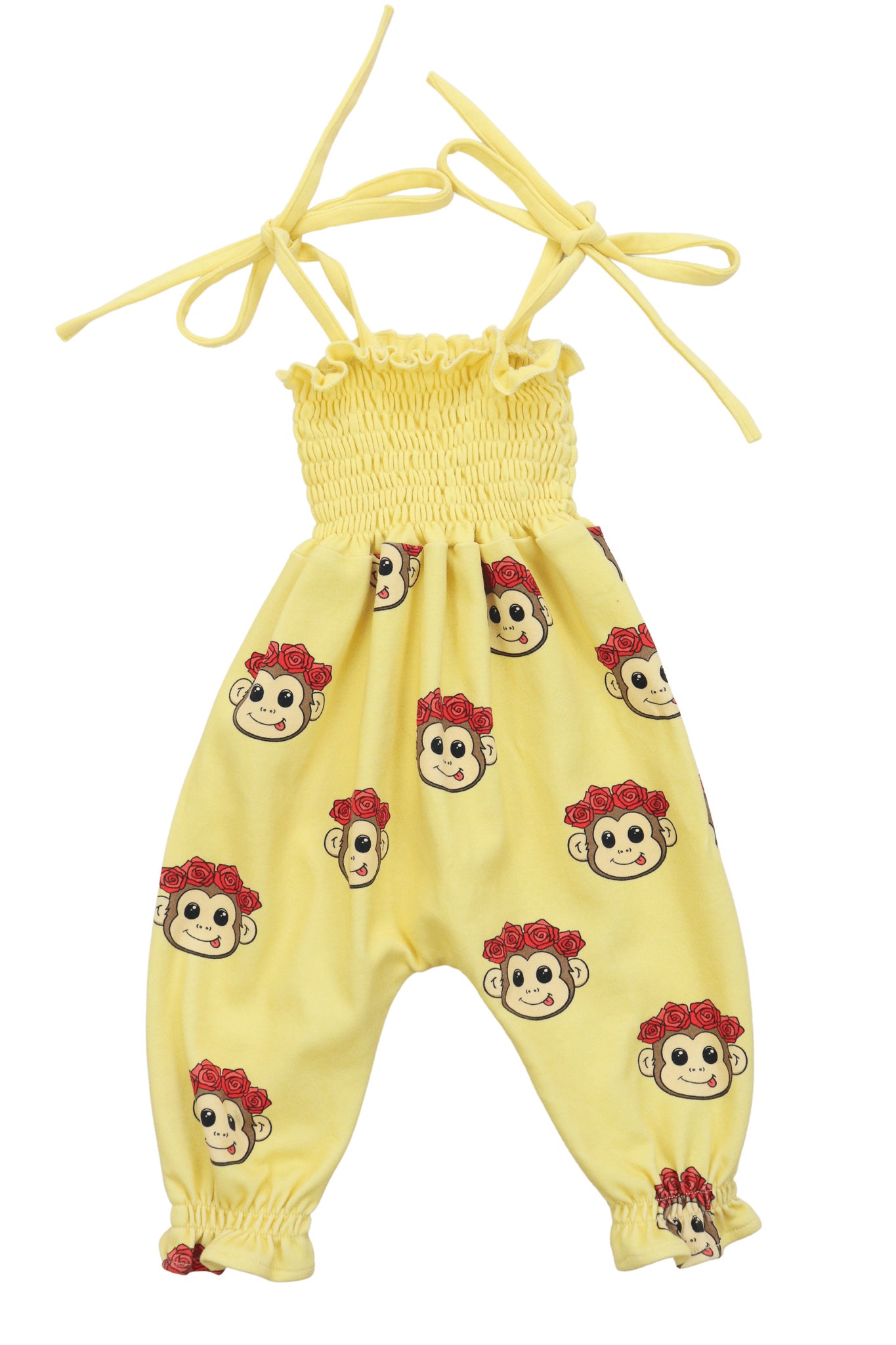 pastel yellow jumpsuit with cute monkey faced printed all over. Shirred top design and thin tie-up straps
